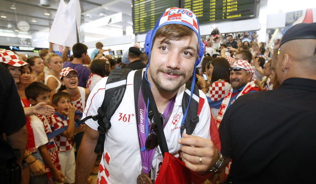 Zagreb, 130812. 
Pleso.
Povratak Hrvatske olimpijske delegacije u Zagreb sa Olimpijskih igara u Londonu.
Na fotografiji: Zlatko Horvat.
Foto: Goran Mehkek / CROPIX