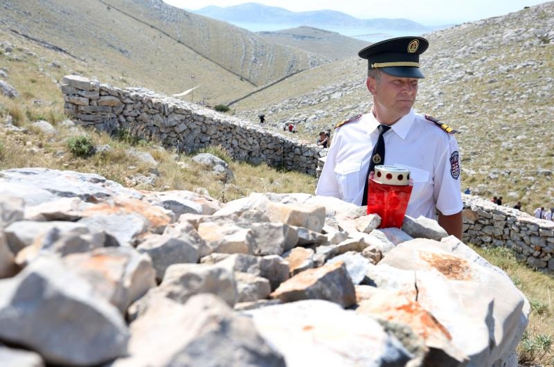 30.08.2015., Kornati – Na otoku Kornatu obiljezena je 8. obljetnica stradanja 12 vatrogasaca iz Sibenika, Vodica i Tisnog. Photo: Dusko Jaramaz/PIXSELL 30.08.2015., Kornati – Na otoku Kornatu obiljezena je 8. obljetnica stradanja 12 vatrogasaca iz Sibenika, Vodica i Tisnog. Photo: Dusko Jaramaz/PIXSELL