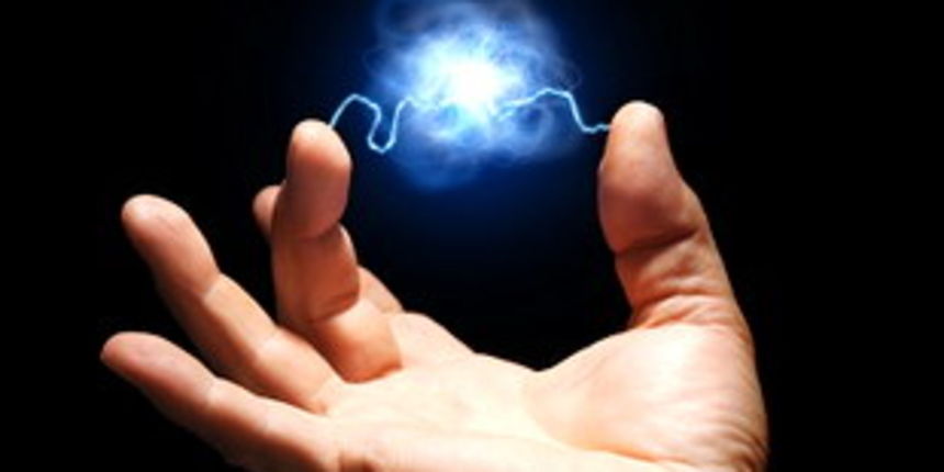 male hand with electricity arcing between thumb and middle finger with plasma ball suspended in the center