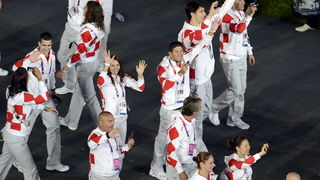 London, 270712.
Olimpijski stadion.
Svecano otvaranje Olimpijskih Igra u Londonu.
Na fotografiji: hrvatski sportasi u defileu, rukometni golman Venio Losert nosi zastavu.
Foto: Drago Sopta / CROPIX