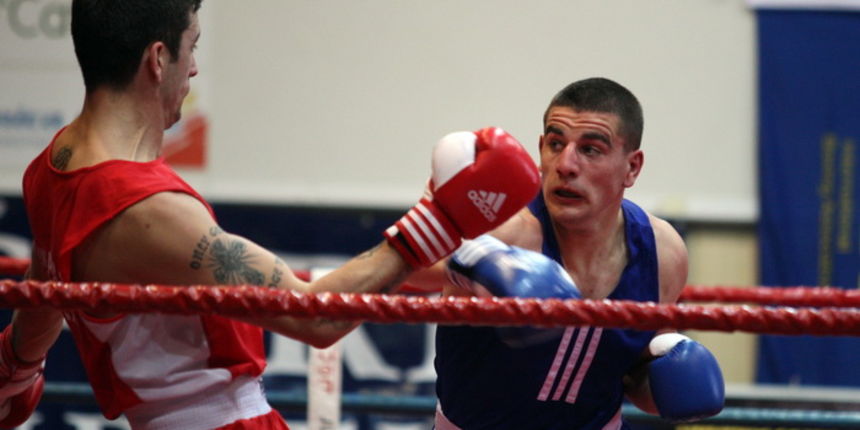 Zadar, 210413. Dvorana Kresimira Cosica. Prvenstvo Hrvatske u boksu. Na fotografiji Marko Calic (Pula, crveni) i Josip Bepo Filipi (Zlatna rukavica, plavi).Foto: Jure Miskovic / CROPIX Zadar, 210413. Dvorana Kresimira Cosica. Prvenstvo Hrvatske u boksu. Na fotografiji Marko Calic (Pula, crveni) i Josip Bepo Filipi (Zlatna rukavica, plavi).Foto: Jure Miskovic / CROPIX