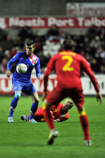 Swansea (Wales), 260313.
Stadion Liberty.
Kvalifikacijska utakmica za Svjetsko prvenstvo u Brazilu 2014. godine, izmedju reprezentacija Walesa i Hrvatske.
Na fotografiji: Dejan Lovren i Johnatan Williams.
Foto: Boris Kovacev / CROPIX Swansea (Wales), 260313.
Stadion Liberty.
Kvalifikacijska utakmica za Svjetsko prvenstvo u Brazilu 2014. godine, izmedju reprezentacija Walesa i Hrvatske.
Na fotografiji: Dejan Lovren i Johnatan Williams.
Foto: Boris Kovacev / CROPIX