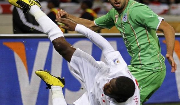 Heskey i Belhadj, Foto: Reuters