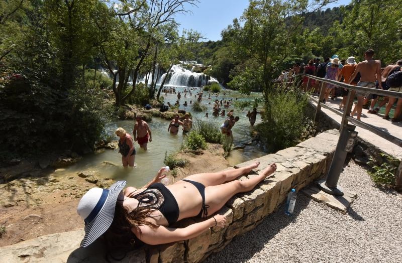 Vrelo ljeto u Nacionalnom parku Krka, hlađenje u Skradinskom buku. Photo: Hrvoje Jelavić/PIXSELL Vrelo ljeto u Nacionalnom parku Krka, hlađenje u Skradinskom buku. Photo: Hrvoje Jelavić/PIXSELL