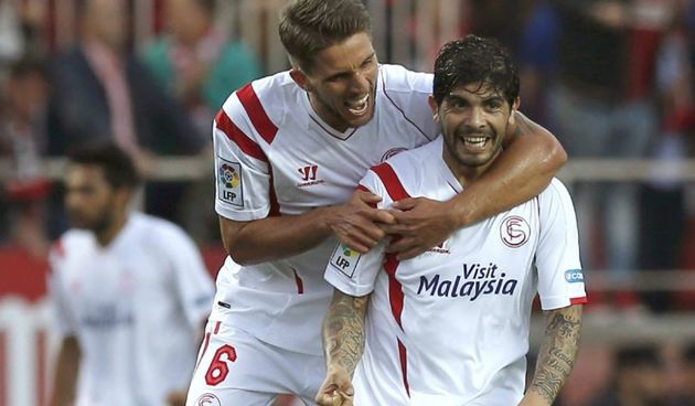 Ever Banega i Daniel Carrico, foto: as.com