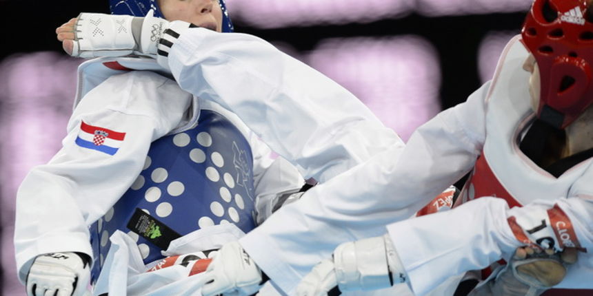 London, 080812.Excel dvorana.Hrvatska taekwondokasica Lucija Zaninovic u kategoriji do 49 kg tokom Olimpijskih Igara u Londonu.Na fotografiji: u cetvrtfinalu pobjedila argentinku Lopez Rodriguez Carola Malvinu te usla u polufinale.Foto: Drago Sopta / London, 080812.Excel dvorana.Hrvatska taekwondokasica Lucija Zaninovic u kategoriji do 49 kg tokom Olimpijskih Igara u Londonu.Na fotografiji: u cetvrtfinalu pobjedila argentinku Lopez Rodriguez Carola Malvinu te usla u polufinale.Foto: Drago Sopta /