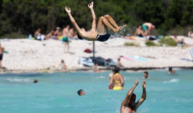 Ljetni dana na dugootočkoj plaži Sakarun, biseru Mediterana s prekrasnim tirkiznim morem, Foto: Filip Brala/PIXSELL