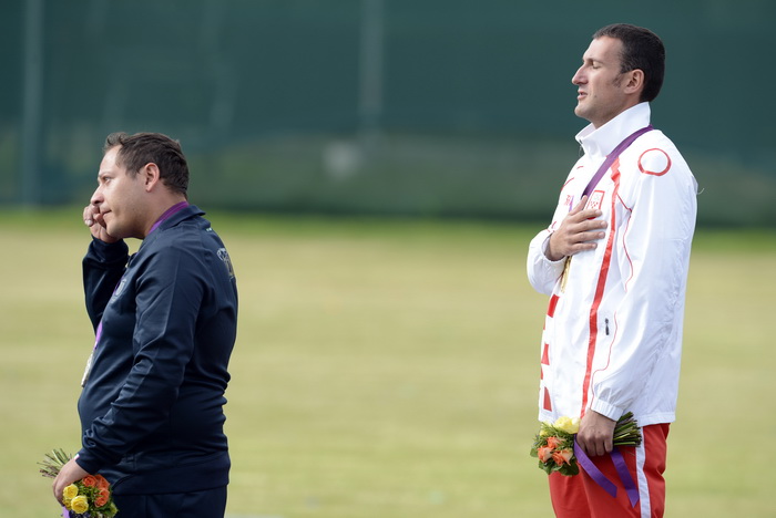 London, 060812.
Hrvatski strijelci Anton Glasnovic i Giovanni Cernogoraz u finalu trapa tijekom Olimpijskih Igara u Londonu.
Na fotografiji: Giovanni Cernogoraz osvojio je zlato.
Foto: Drago Sopta / CROPIX