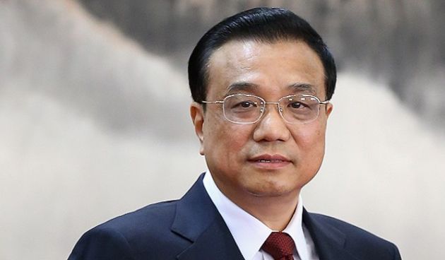 (L-R) Xi Jinping, Li Keqiang, Zhang Dejiang, Yu Zhengsheng, Liu Yunshan, Zhang Gaoli and Wang Qishan greet the media at the Great Hall of the People on November 15, 2012 in Beijing, China. China’s ruling Communist Party today revealed the new Politburo St