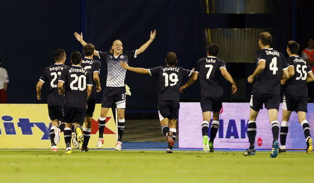 Zagreb, 080812.Stadion Maksimir.Uzvratna utakmica 3. predkola Lige prvaka izmedju GNK Dinamo i FC Sheriff.Na slici: Dinamo igraci slave pogodak Domagoja Vide.Foto: Tomislav Kristo / CROPIX