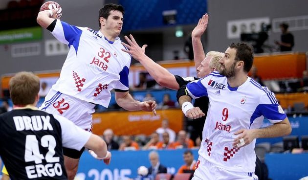 30.01.2015., Ali Bin Hamad Al Attiya Arena, Al Sadd, Doha, Katar – 24. svjetsko rukometno prvenstvo, utakmica za plasman od 5. do 8. mjesta, Hrvatska – Njemacka. Ivan Sliskovic, Patrick Wiencek, Igor Vori. Photo: Goran Stanzl/PIXSELL