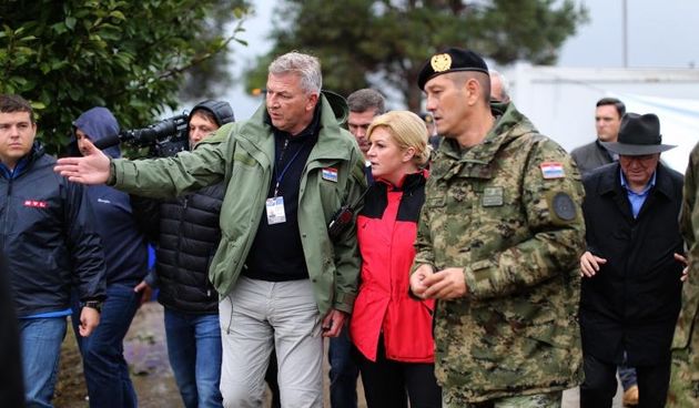 Predsjednica Republike Hrvatske Kolinda Grabar-Kitarovic obisla je granicni prijelaz Bapska i izbjeglicki kamp Opatovac. Ministar Ranko Ostojic. Photo: Marko Mrkonjic/PIXSELL