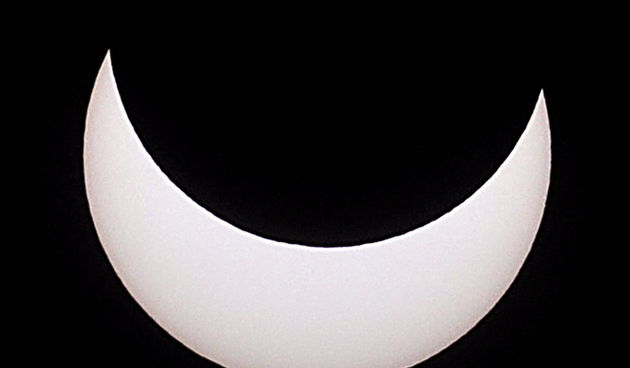 Split, 40111.
Djelomicna pomrcina Sunca u Splitu snimljena sa vidilice na Marjanu. 
Na slici: djelomicna pomrcina Sunca.
Foto: Jadran Babic / CROPIX