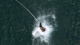 28.6.2014., Maslenica – Gimnasticar Marijo Moznik otvorio je sezonu bungee skokova s Maslenickog mosta. On je izveo dvostruki salto s uronom u more. Photo: Dino Stanin/PIXSELL