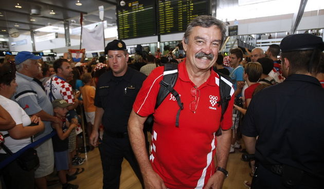 Zagreb, 130812. Pleso.Povratak Hrvatske olimpijske delegacije u Zagreb sa Olimpijskih igara u Londonu.Na fotografiji: Ratko Rudic.Foto: Goran Mehkek / CROPIX