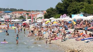 Uživanje u ljetu na vodičkim plažama. Photo: Duško Jaramaz/PIXSELL Uživanje u ljetu na vodičkim plažama. Photo: Duško Jaramaz/PIXSELL