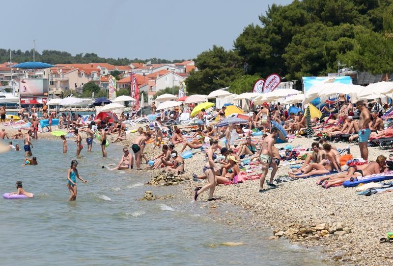 Uživanje u ljetu na vodičkim plažama. Photo: Duško Jaramaz/PIXSELL Uživanje u ljetu na vodičkim plažama. Photo: Duško Jaramaz/PIXSELL