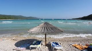 Ljetni dana na dugootočkoj plaži Sakarun, biseru Mediterana s prekrasnim tirkiznim morem, Foto: Filip Brala/PIXSELL Ljetni dana na dugootočkoj plaži Sakarun, biseru Mediterana s prekrasnim tirkiznim morem, Foto: Filip Brala/PIXSELL