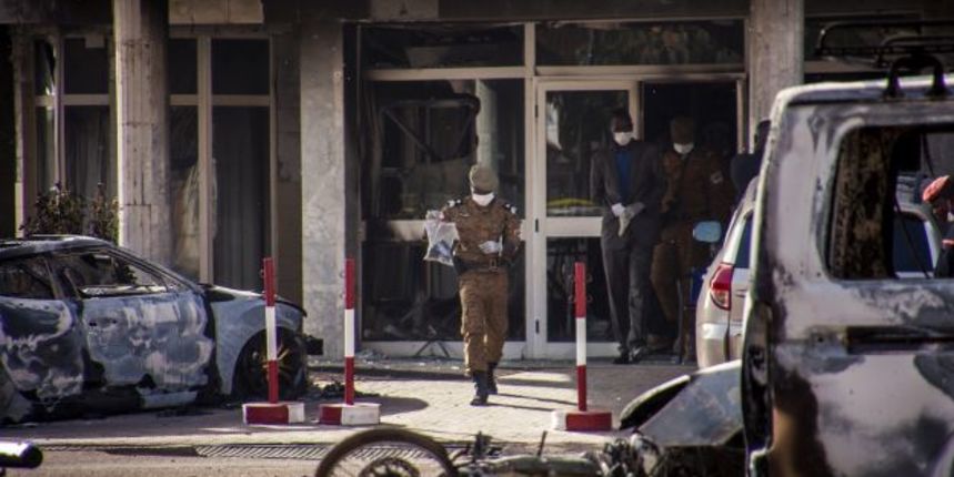 epa05105723 A military investigator from Burkina Faso carries evidence out of the Splendid Hotel in Ouagadougou, Burkina Faso 16 January 2016. According to media reports at least 23 people from 18 nationalities have been killed after Islamist militants at epa05105723 A military investigator from Burkina Faso carries evidence out of the Splendid Hotel in Ouagadougou, Burkina Faso 16 January 2016. According to media reports at least 23 people from 18 nationalities have been killed after Islamist militants at