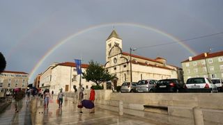 11.09.2014., Zadar – Kisni je dan na nekoliko minuta uljepsala duga koja se pojavila nad gradom. Photo: Filip Brala/PIXSELL