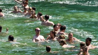 Rješenje za osvježenje: Kupanje u ledenoj rijeci Krki u NP Krka. Photo: Hrvoje Jelavić/PIXSELL