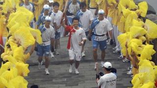 Olimpijska baklja na kineskom zidu