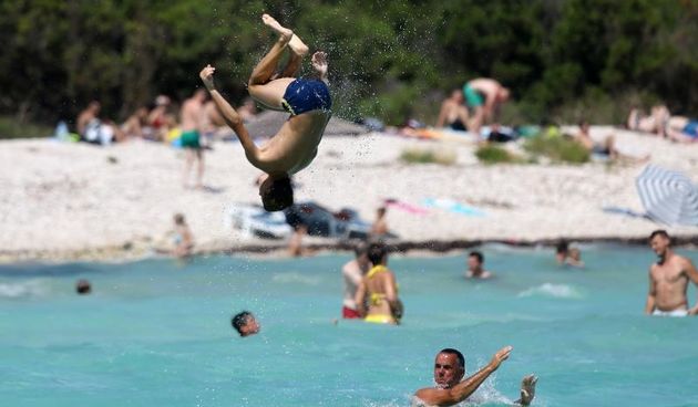 Ljetni dana na dugootočkoj plaži Sakarun, biseru Mediterana s prekrasnim tirkiznim morem, Foto: Filip Brala/PIXSELL