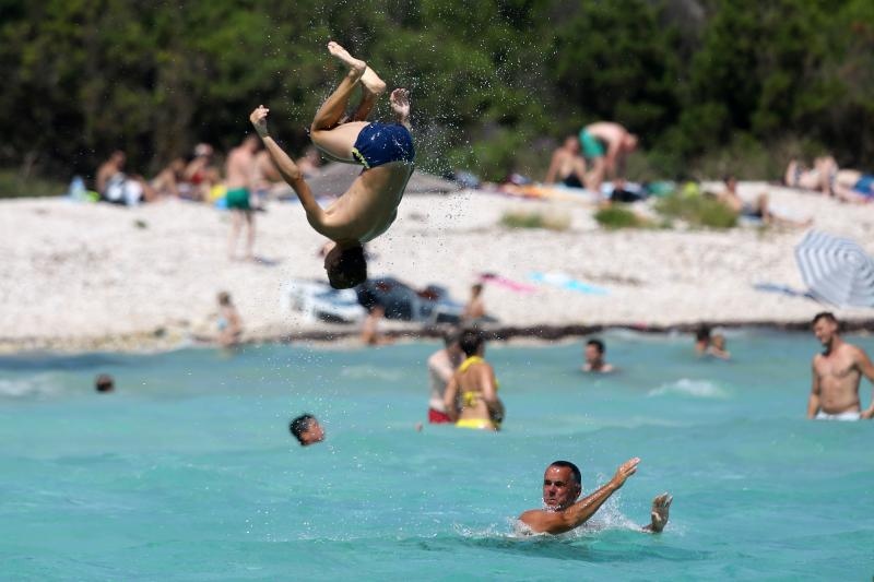 Ljetni dana na dugootočkoj plaži Sakarun, biseru Mediterana s prekrasnim tirkiznim morem, Foto: Filip Brala/PIXSELL Ljetni dana na dugootočkoj plaži Sakarun, biseru Mediterana s prekrasnim tirkiznim morem, Foto: Filip Brala/PIXSELL
