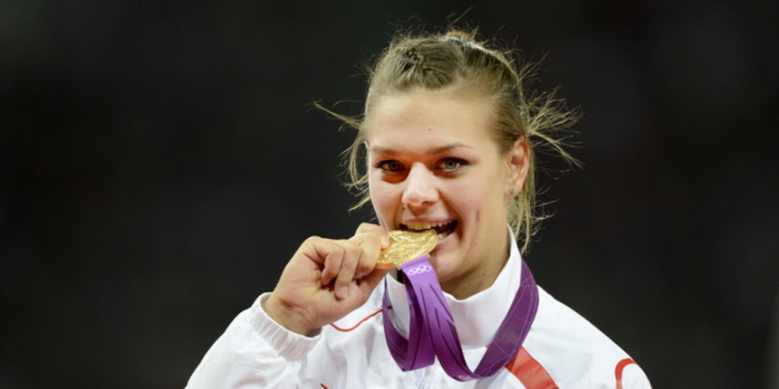 London, 040812.Olimpijski stadion.Hrvatska atleticarka Sandra Perkovic u finalu u bacanju diska na Olimpijskim Igrama u Londonu osvojila je zlatnu medalju.Na slici: Dodjela medalja, Sandra Perkovic.Foto: Drago Sopta / CROPIX London, 040812.Olimpijski stadion.Hrvatska atleticarka Sandra Perkovic u finalu u bacanju diska na Olimpijskim Igrama u Londonu osvojila je zlatnu medalju.Na slici: Dodjela medalja, Sandra Perkovic.Foto: Drago Sopta / CROPIX