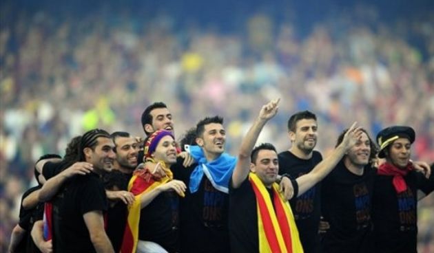 FC Barcelona players celebrate after winning the Champions League // AP Photo