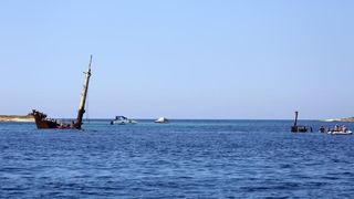 05.08.2013., Dugi Otok – Pored mjesta Veli rat na Dugom Otoku brod koji je prije vise godina nasukan, polako izgriza more, ali dok je jos uvijek tu prava je turisticka atrakcija gdje turisti rone i istrazuju njegovu potopljenu unutrasnjost. Photo: Filip 05.08.2013., Dugi Otok – Pored mjesta Veli rat na Dugom Otoku brod koji je prije vise godina nasukan, polako izgriza more, ali dok je jos uvijek tu prava je turisticka atrakcija gdje turisti rone i istrazuju njegovu potopljenu unutrasnjost. Photo: Filip