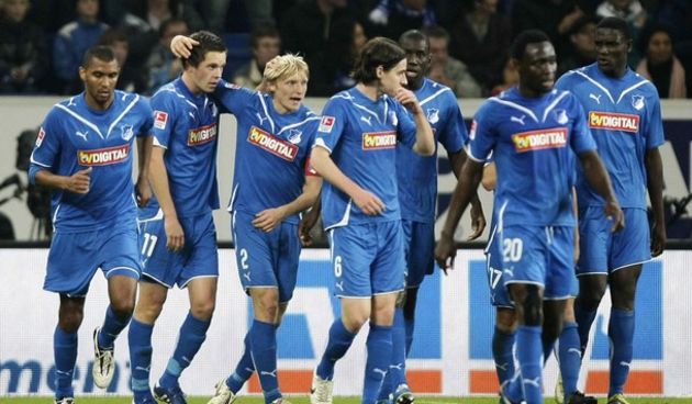 TSG Hoffenheim Gylfi Sigurdsson celebrates a goal with Andreas Beck  // Reuters