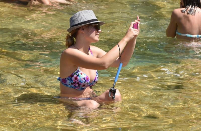 Vrelo ljeto u Nacionalnom parku Krka, hlađenje u Skradinskom buku. Photo: Hrvoje Jelavić/PIXSELL Vrelo ljeto u Nacionalnom parku Krka, hlađenje u Skradinskom buku. Photo: Hrvoje Jelavić/PIXSELL