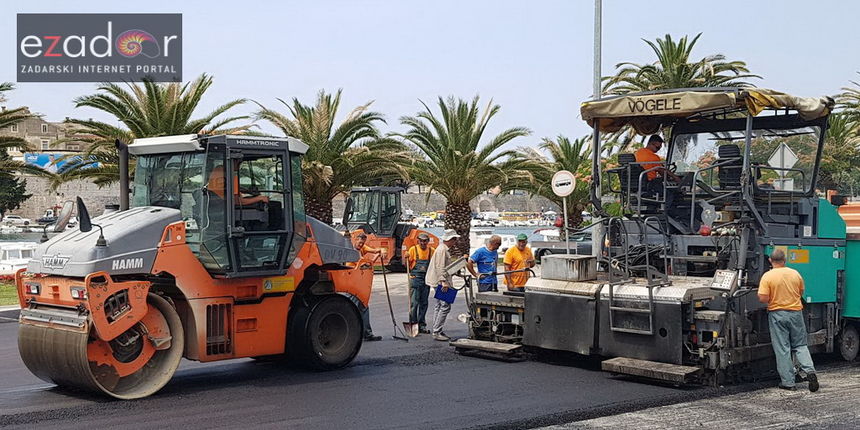 Asfaltiranje kolnika rekonstruiranog i proširenog križanja kod Veslačkog Asfaltiranje kolnika rekonstruiranog i proširenog križanja kod Veslačkog