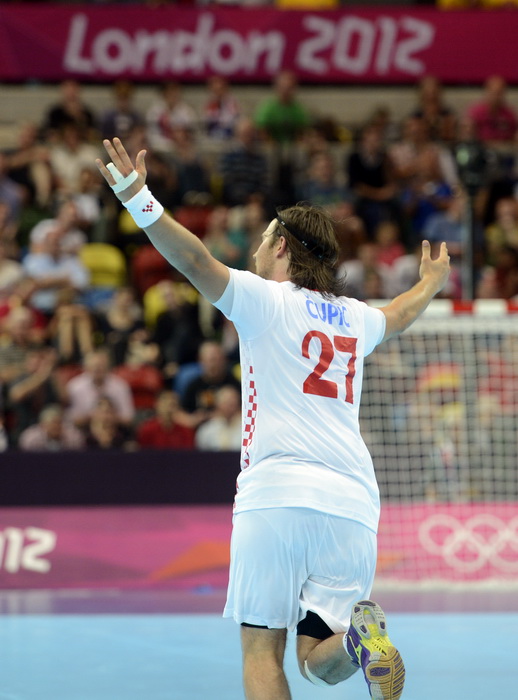 London, 310712.
Dvorana Copper Box.
Hrvatska muska rukometna reprezentacija igra utakmicu 2. kolo u skupini B protiv Srbije tokom Olimpijskih Igra u Londonu.
Na fotografiji: Ivan Cupic slavi nakon gola.
Foto: Drago Sopta / CROPIX