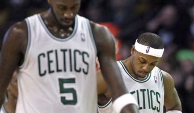 Boston Celtics Kevin Garnett (5) and teammate Paul Pierce  // AP Photo