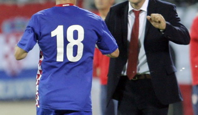 Minsk, 120809.
Stadion Dinamo Minsk
Kvalifikacijska nogometna utakmica za Svjetsko nogometno prvenstvo 2010. Bjelorusija – Hrvatska. 
Na fotografiji:  Ivica Olic i Slaven Bilic.
Foto : Jakov Prkic / Cropix