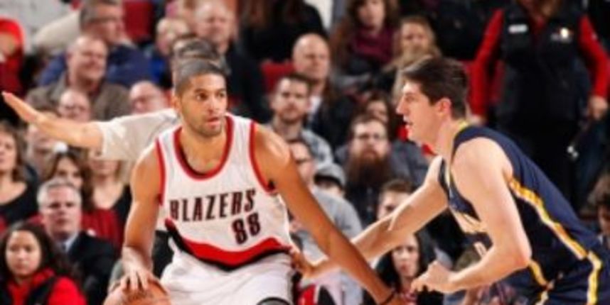 Nicolas Baturm i Damjan Rudež, foto: nba.com