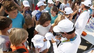 Zlatni olimpijci Fantela i Marenić družili se sa šibenskom djecom povodom dana jedrenja. Photo: Duško Jaramaz/PIXSELL Zlatni olimpijci Fantela i Marenić družili se sa šibenskom djecom povodom dana jedrenja. Photo: Duško Jaramaz/PIXSELL