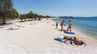 Kombo fotografije: Kako COVID-19 utječe na turističku sezonu