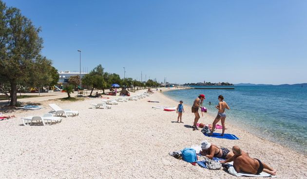 Kombo fotografije: Kako COVID-19 utječe na turističku sezonu