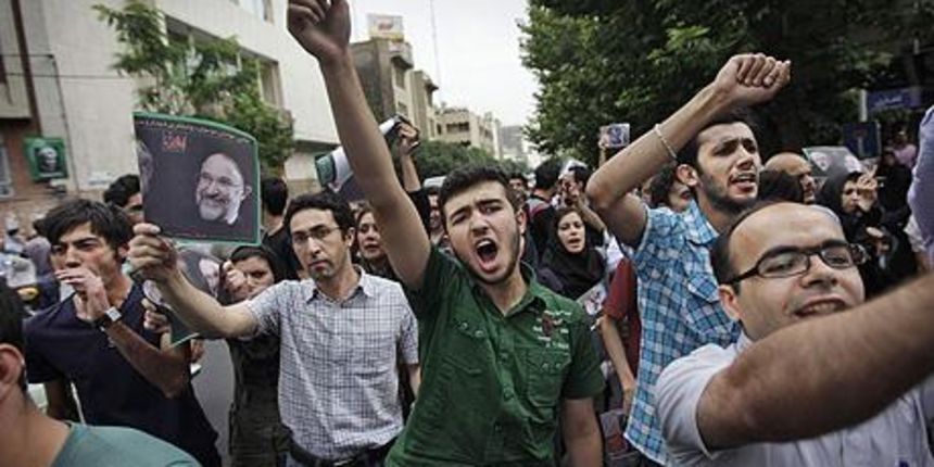 Supporters of reformist candidate Mir Hossein Mousavi, some wearing green, the color of the party, gather on the streets protesting the results of the Iranian presidential election in Tehran, Iran, Saturday, June 13, 2009. Iranian riot police have clashed Supporters of reformist candidate Mir Hossein Mousavi, some wearing green, the color of the party, gather on the streets protesting the results of the Iranian presidential election in Tehran, Iran, Saturday, June 13, 2009. Iranian riot police have clashed