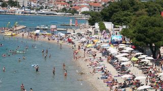 Uživanje u ljetu na vodičkim plažama. Photo: Duško Jaramaz/PIXSELL Uživanje u ljetu na vodičkim plažama. Photo: Duško Jaramaz/PIXSELL