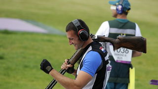London, 060812.
Hrvatski strijelci Anton Glasnovic i Giovanni Cernogoraz u finalu trapa tijekom Olimpijskih Igara u Londonu.
Na fotografiji: Giovanni Cernogoraz osvojio je zlato, u pozadini Australac Michael Diamond koji je u finale usao bez jednog promas