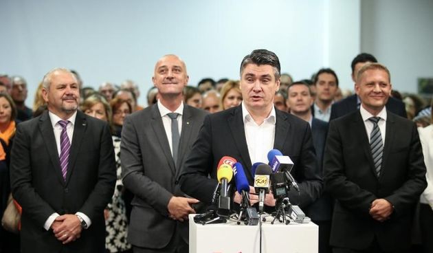 Predsjednici stranaka Narodne koalicije (SDP, HNS, HSS i HSU) potpisali su Sporazum o zajednickom izlasku na izbore za Hrvatski sabor 11. rujna. Silvano Hrelja, Ivan Vrdoljak, Zoran Milanovic, Kreso Beljak. Photo: Petar Glebov/PIXSELL