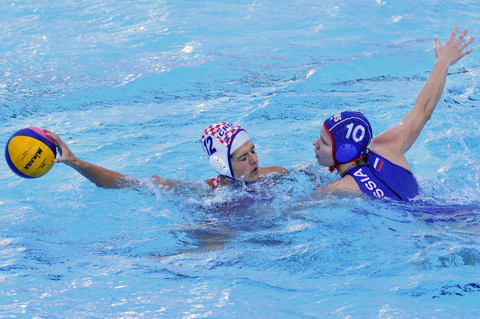 Zagreb, 310810.
Bazen Mladosti, Jarunska 5.
Utakmica zenskog vaterpola u sklopu Europskog prvenstva, izmedju Hrvatske i Rusije.
Na slici: Ana Gavran (Hrvatska) i Olga Belyaeva (Rusija).
Foto: Boris Kovacev / CROPIX Zagreb, 310810.
Bazen Mladosti, Jarunska 5.
Utakmica zenskog vaterpola u sklopu Europskog prvenstva, izmedju Hrvatske i Rusije.
Na slici: Ana Gavran (Hrvatska) i Olga Belyaeva (Rusija).
Foto: Boris Kovacev / CROPIX