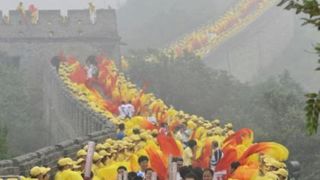 Olimpijska baklja na kineskom zidu
