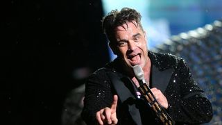 13.08.2013., Zagreb – Britanski pjevac Robbie Williams odrzao je koncert na maksimirskom stadionu u sklopu turneje Take the crown. Photo: Petar Glebov/Pixsell 13.08.2013., Zagreb – Britanski pjevac Robbie Williams odrzao je koncert na maksimirskom stadionu u sklopu turneje Take the crown. Photo: Petar Glebov/Pixsell