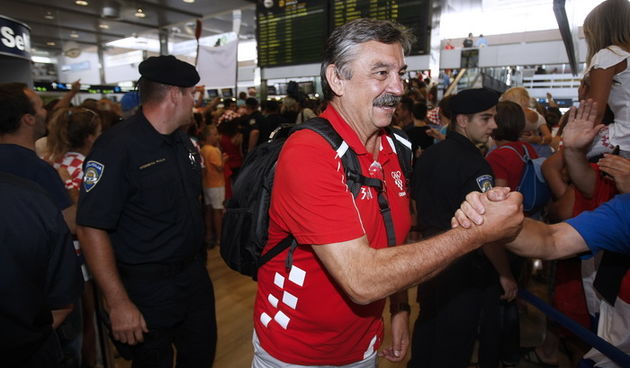 Zagreb, 130812. 
Pleso.
Povratak Hrvatske olimpijske delegacije u Zagreb sa Olimpijskih igara u Londonu.
Na fotografiji: Ratko Rudic.
Foto: Goran Mehkek / CROPIX