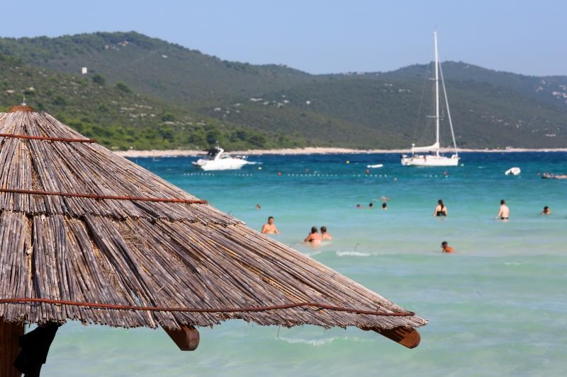 Ljetni dana na dugootočkoj plaži Sakarun, biseru Mediterana s prekrasnim tirkiznim morem, Foto: Filip Brala/PIXSELL Ljetni dana na dugootočkoj plaži Sakarun, biseru Mediterana s prekrasnim tirkiznim morem, Foto: Filip Brala/PIXSELL